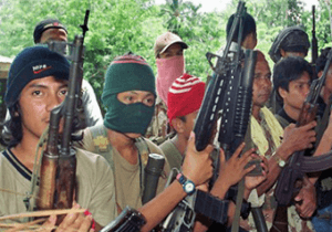 Militants threaten to behead Malaysian captive
