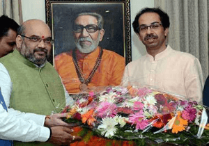 Udhav attends swearing in ceremony