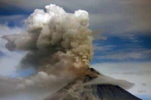 Restive volcano in Philippines spews gas  steam