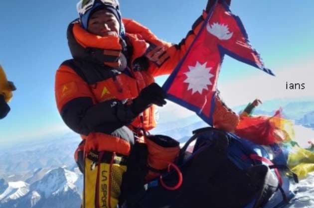 Nepali guide breaks own record by climbing Everest 25 times