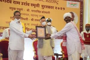 Governor presents first Jagdeo Ram Oram memorial award to late Ramdas Gavit