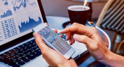 Sensex, Nifty End Flat in Highly Volatile Trade