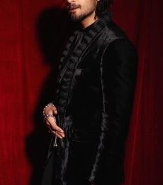 Actor Ali Fazal posing in a stylised photograph