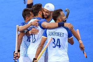 Indian hockey players hugging each other in joy after defeating New Zealand in the Paris Olympics 2024