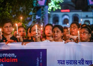 Members of NBCA stage a candlelight protest against the rape and murder of a young medic at RG Kar Medical College