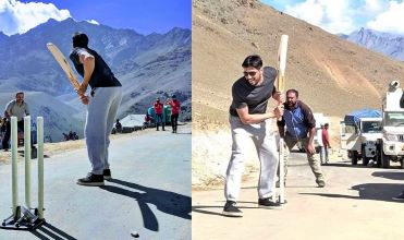 Bollywood actor Sidharth malhotra playing cricket during a shoot-break in a mountain pass.