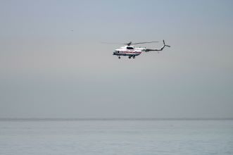 Photo taken on Dec. 27, 2016, shows a helicopter taking part in a rescue operation on the Black Sea coast at the crash site of Russian Defense Ministry's Tu-154 aircraft near Sochi, Russia. The main flight recorder of the Russian military Tu-154 aircraft that crashed Sunday into the Black Sea has been retrieved from the wreckage, the Russian Defense Ministry said Tuesday. (Xinhua/Sputnik) (sxk/IANS)