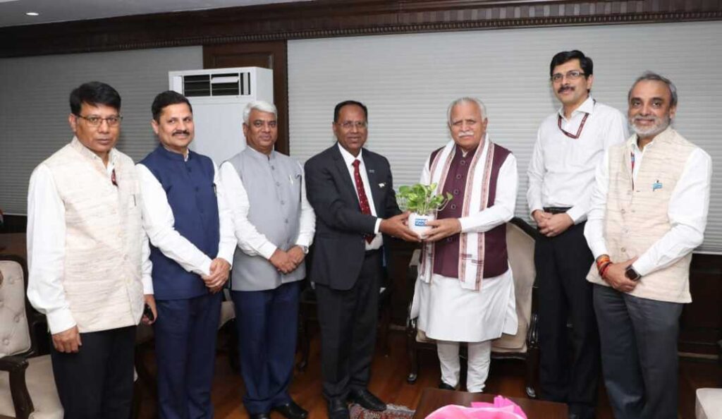 NHPC top brass met with Union Power Minister Manohar Lal after the PSU was conferred Navratna Status. Credit: @nhpcltd