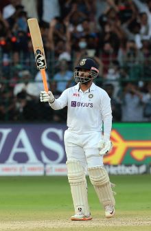 Bengaluru:India's Rishabh Pant celebrates scoring fifty runs during the second day of the second cricket test match between India and Sri Lanka in Bengaluru,on Sunday, March 13, 2022. (Photo:Raj Kumar/IANS)